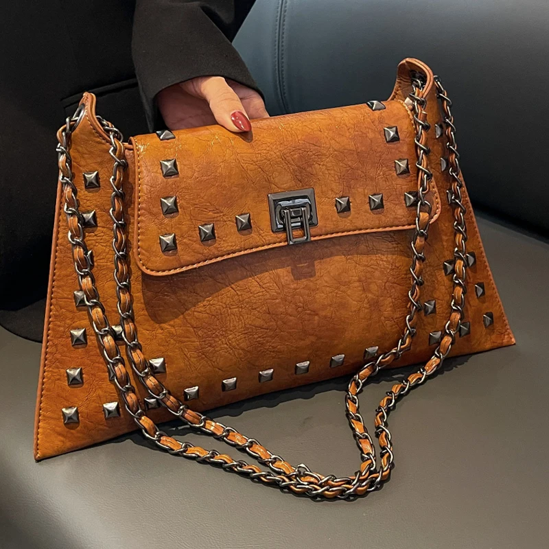 2024 New Punk Willow Nail Envelope Bag Underarm Bag Single Shoulder Crossbody Handbag Motorcycle Cool and Fashionable
2024 New Punk Willow Nail Envelope Bag Underarm Bag Single Shoulder Crossbody Handbag Motorcycle Cool and Fashionable