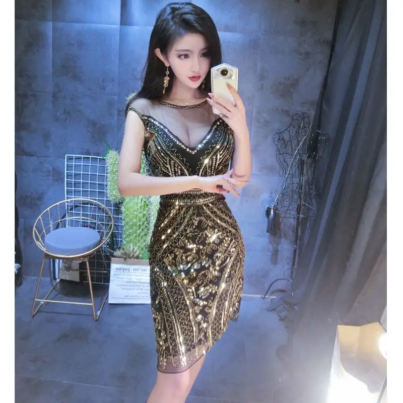 2022 New Women's Fashion Nightclub Sequins Sexy Round Neck Topless Dress Temperament Elegant Ladies High-end Dinner Dress Skirt
2022 New Women's Fashion Nightclub Sequins Sexy Round Neck Topless Dress Temperament Elegant Ladies High-end Dinner Dress Skirt
