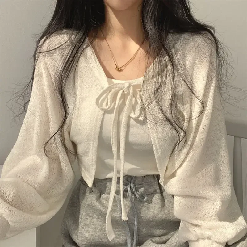Thin White Cardigan Women Summer Sunscreen Lace-up Knitwear Top Female Korean Style Lantern Sleeve Short Coat Casual Elegant Top
Thin White Cardigan Women Summer Sunscreen Lace-up Knitwear Top Female Korean Style Lantern Sleeve Short Coat Casual Elegant Top