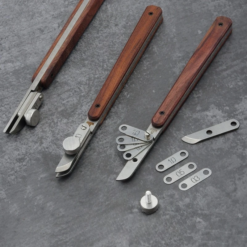 Регулируемые режущие инструменты для кожи 0,3-5,8 мм, профессиональные ручные инструменты для резки кромок «сделай сам», портативный маленький инструмент с деревянной ручкой
Регулируемые режущие инструменты для кожи 0,3-5,8 мм, профессиональные ручные инструменты для резки кромок «сделай сам», портативный маленький инструмент с деревянной ручкой