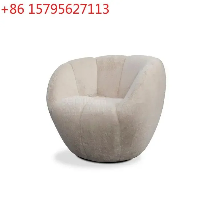 Italian villa living room light luxury metal bottom curved single beige rotating sofa
Italian villa living room light luxury metal bottom curved single beige rotating sofa