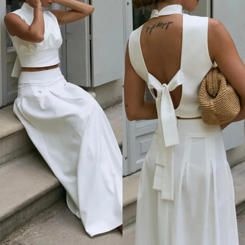 Women’s Summer Loose White 2 Piece Set Sleeveless Tank Top High Waist Long Skirt Set 2025 Fashion Streetwear Casual Outfit New
Women’s Summer Loose White 2 Piece Set Sleeveless Tank Top High Waist Long Skirt Set 2025 Fashion Streetwear Casual Outfit New