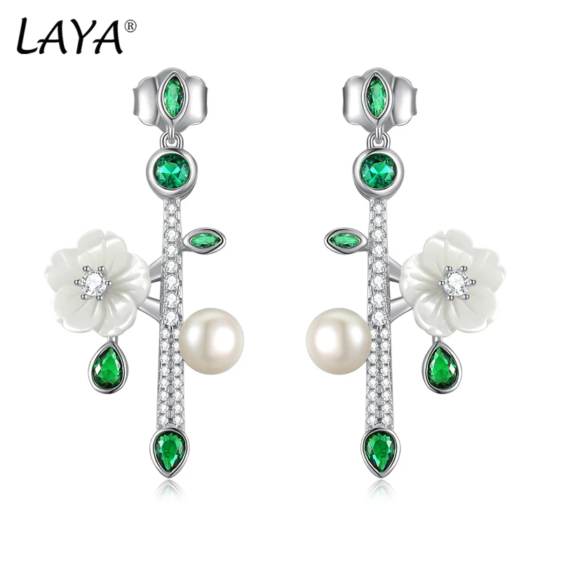 Серьги-гвоздики LAYA для женщин, белые ракушки, цветок, блестящий циркон, натуральный жемчуг, стерлинговое серебро 925 пробы, роскошные ювелирные изделия для свадебной вечеринки
Серьги-гвоздики LAYA для женщин, белые ракушки, цветок, блестящий циркон, натуральный жемчуг, стерлинговое серебро 925 пробы, роскошные ювелирные изделия для свадебной вечеринки