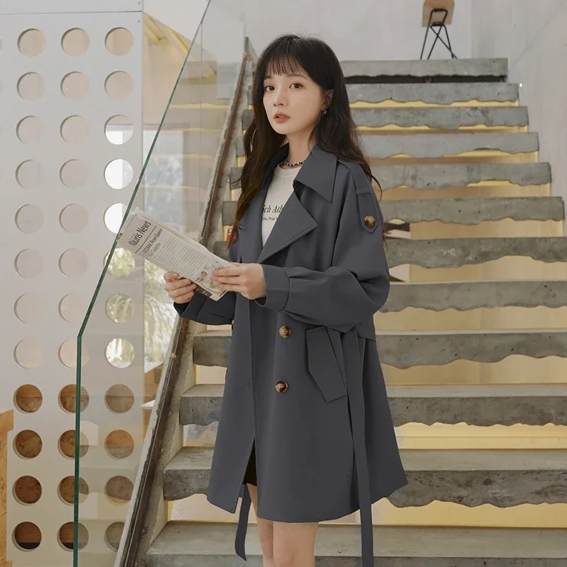 Women's Grey Double Breasted Mid Length Trench Coat with Belt and Lapel Collar
Women's Grey Double Breasted Mid Length Trench Coat with Belt and Lapel Collar