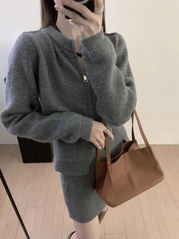 Autumn Winter Women Solid Long Sleeved Round Neck Zipper Cardigan Knitted Sweater Tops And High Waist Short Skirt Two Piece Sets
Autumn Winter Women Solid Long Sleeved Round Neck Zipper Cardigan Knitted Sweater Tops And High Waist Short Skirt Two Piece Sets
