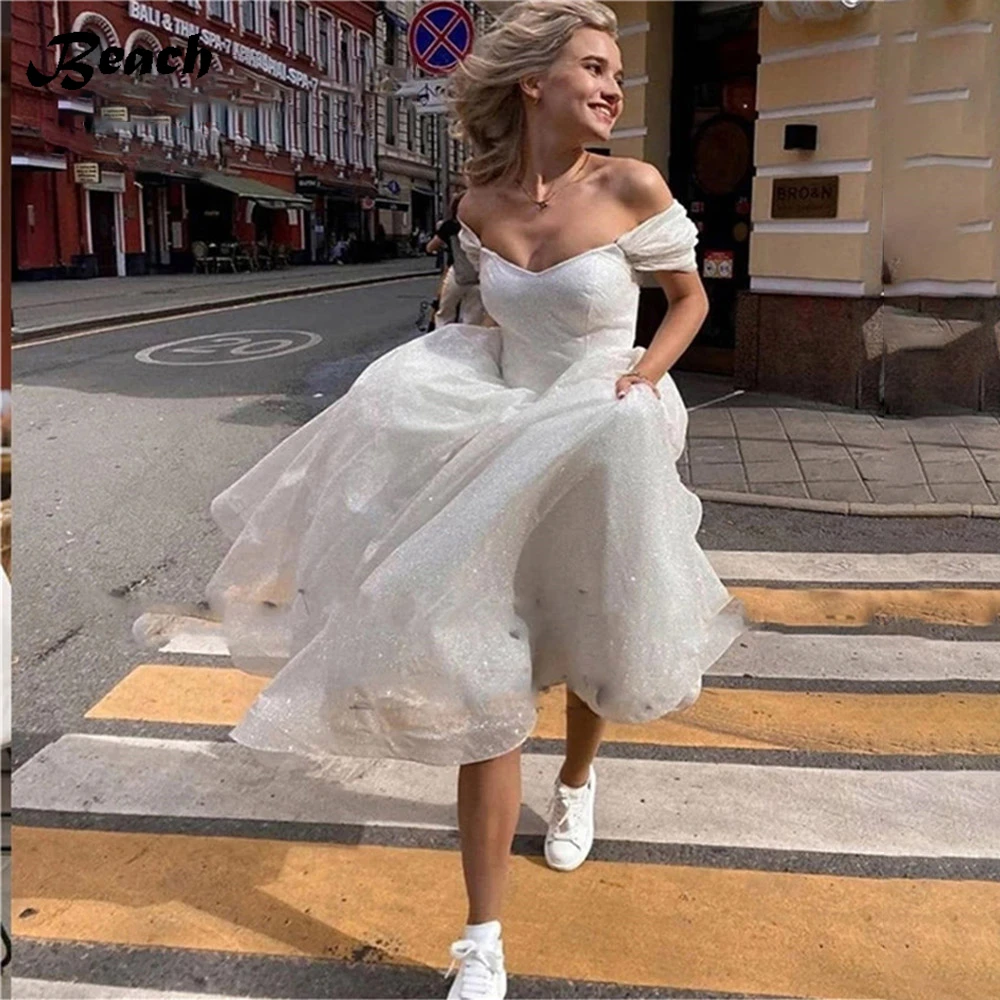 BEACH Bohemian Wedding Dresses Boho Off The Shoulder Short Sleeves Back Lace Up Bridal Gowns A-Line Corset Bride Robes 2023
BEACH Bohemian Wedding Dresses Boho Off The Shoulder Short Sleeves Back Lace Up Bridal Gowns A-Line Corset Bride Robes 2023
