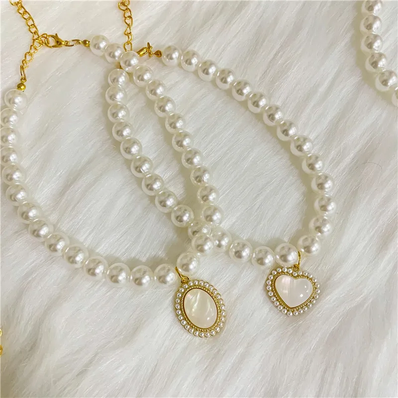 Cute Pet Jewelry Pearl Collar Bling Rhinestones Pet Pearl Necklace Small Cat Dog Collar Love Pendant Dog Accessory
Cute Pet Jewelry Pearl Collar Bling Rhinestones Pet Pearl Necklace Small Cat Dog Collar Love Pendant Dog Accessory