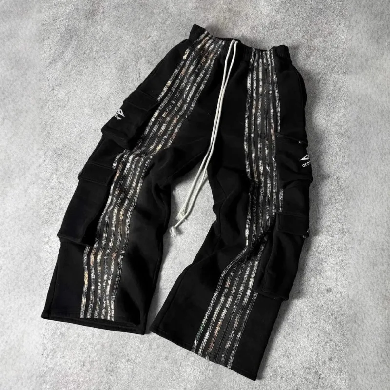 Мужские широкие брюки-карго с простым полосатым дизайном, множеством карманов, высококачественной эластичной тканью, низкой посадкой, в стиле рок, хип-хоп, уличный стиль.
Мужские широкие брюки-карго с простым полосатым дизайном, множеством карманов, высококачественной эластичной тканью, низкой посадкой, в стиле рок, хип-хоп, уличный стиль.