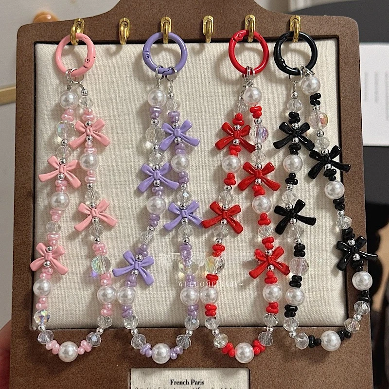 Korean Light Luxury Bow Pearl Phone Chain Lanyard Keychain For iPhone Hanging Rope Jewelry Charm Strap Wrist Bead Cord Bracelet
Korean Light Luxury Bow Pearl Phone Chain Lanyard Keychain For iPhone Hanging Rope Jewelry Charm Strap Wrist Bead Cord Bracelet