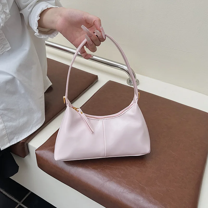 Новая универсальная модная женская сумка — высококачественная нишевая сумка через плечо, подмышками 
Новая универсальная модная женская сумка — высококачественная нишевая сумка через плечо, подмышками