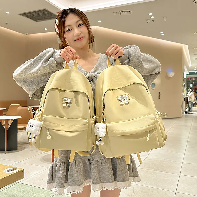 Minimalist Cream Yellow Backpack For Women Durable Casual Rucksack With Cloud Charm & Patch Detail
Minimalist Cream Yellow Backpack For Women Durable Casual Rucksack With Cloud Charm & Patch Detail