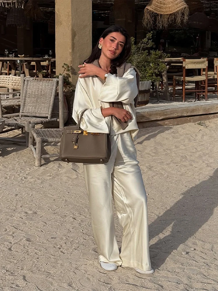 Elegant Women's Two Piece Pants Set Satin Long Sleeve Top Matching Wide Leg Pant Ivory Loose Fit Casual Comfort Resort Outfit
Elegant Women's Two Piece Pants Set Satin Long Sleeve Top Matching Wide Leg Pant Ivory Loose Fit Casual Comfort Resort Outfit