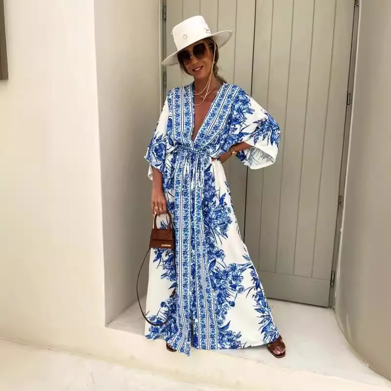 Spring-summer temperament V-neck short-sleeved printed slit with a large skirt dress for women
Spring-summer temperament V-neck short-sleeved printed slit with a large skirt dress for women