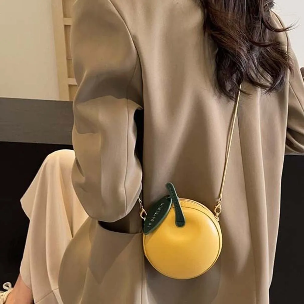 Кошелек-монетница в форме фрукта с цепочкой, большая вместимость, однотонный, кожаный, круглый, из полиэстера, водоотталкивающий
Кошелек-монетница в форме фрукта с цепочкой, большая вместимость, однотонный, кожаный, круглый, из полиэстера, водоотталкивающий