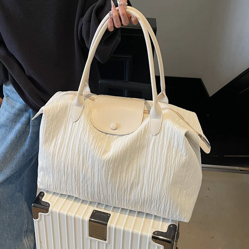 Large Capacity Short Business Trip Commuter Travel Bag for Women 2026 Light Fashion Female Luggage Bag Shoulder Tote Fitness Bag
Large Capacity Short Business Trip Commuter Travel Bag for Women 2026 Light Fashion Female Luggage Bag Shoulder Tote Fitness Bag