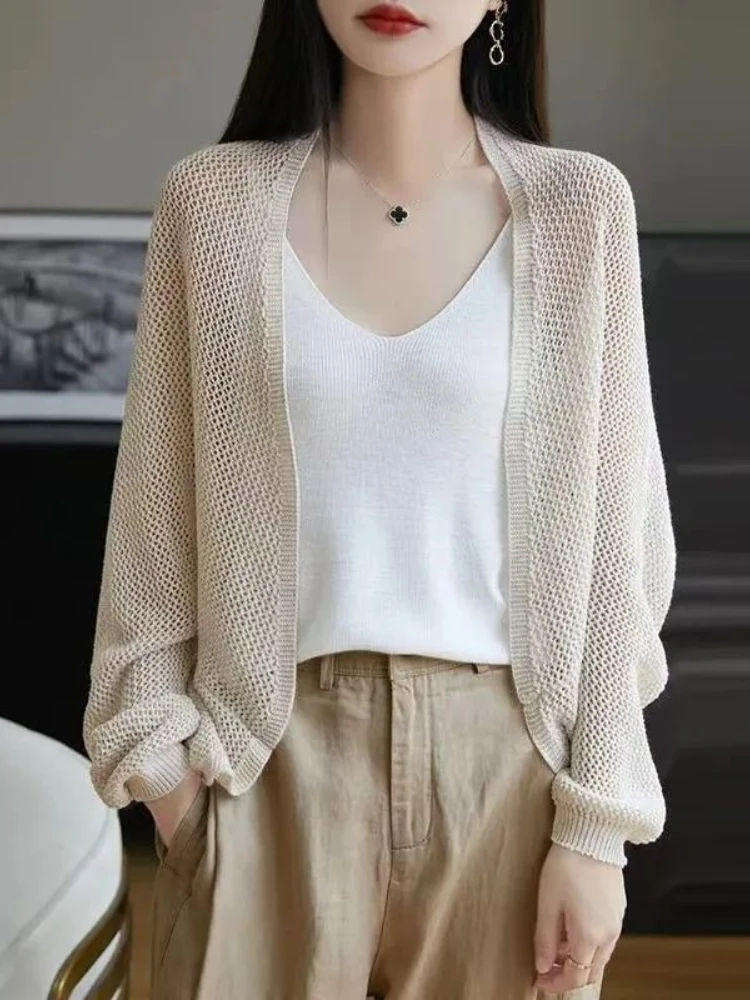 Summer Thin Hollow Long Sve Sun Protection Knitted Open Cardigan Women Loose Faion Versatile Air Conditioned Pure Color Top
Summer Thin Hollow Long Sve Sun Protection Knitted Open Cardigan Women Loose Faion Versatile Air Conditioned Pure Color Top