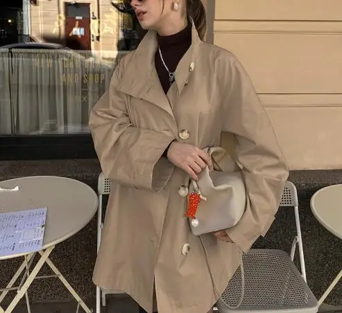 Autumn Fashion Trend Solid Color Lapel Button Trench Coat for Women's Casual and Simple Style Loose Long Sleeved Trench Coat 
Autumn Fashion Trend Solid Color Lapel Button Trench Coat for Women's Casual and Simple Style Loose Long Sleeved Trench Coat