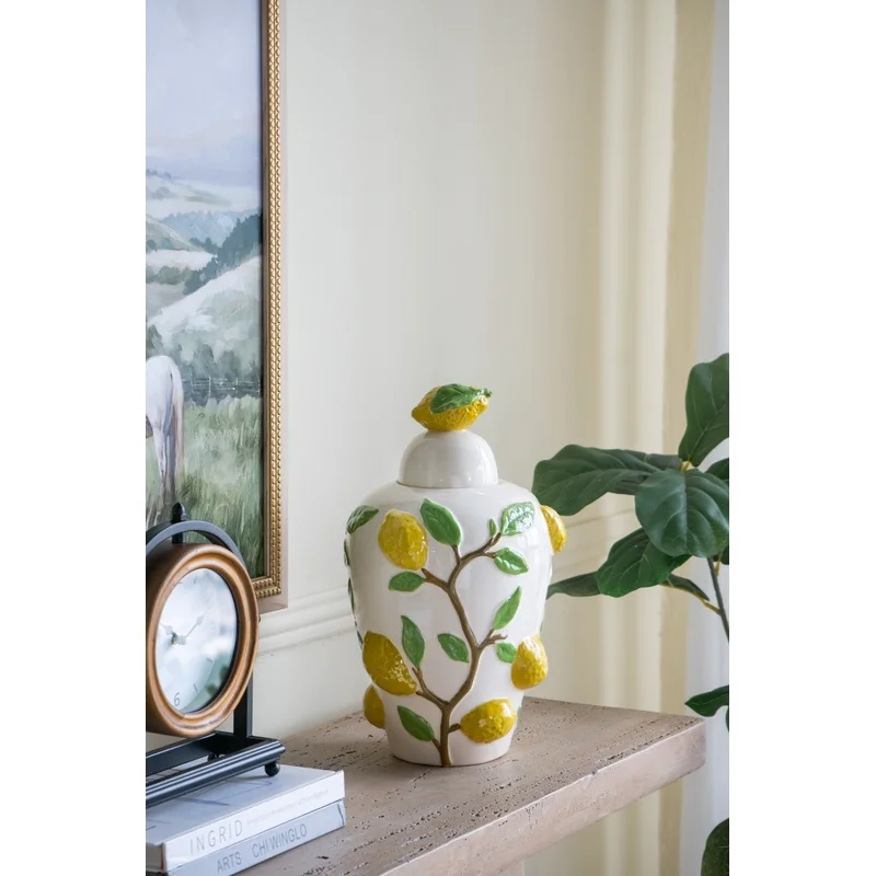 White Ceramic Lidded Jar with Lemon Design 8.7x8.7x15 inches
White Ceramic Lidded Jar with Lemon Design 8.7x8.7x15 inches