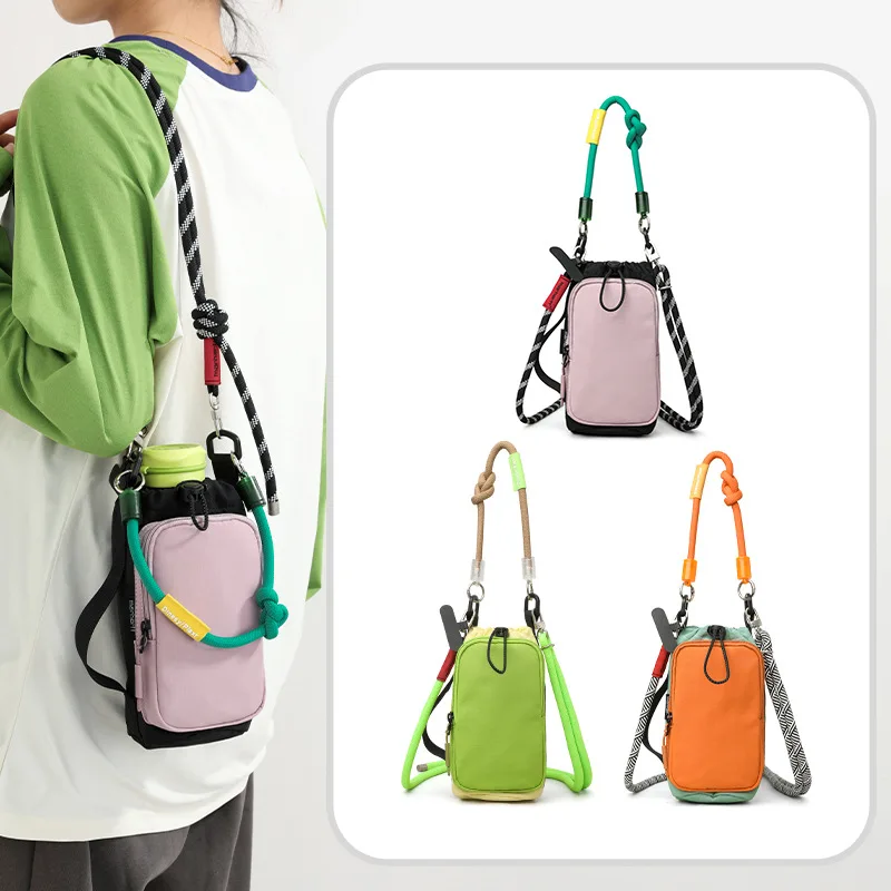 Outdoor light and simple climbing diagonal cross small bag nylon color water bottle storage bundle mouth shoulder bag
Outdoor light and simple climbing diagonal cross small bag nylon color water bottle storage bundle mouth shoulder bag
