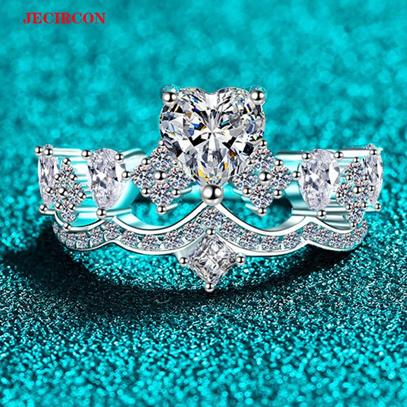 JECIRCON Fashion's New Darling! 1CT Heart Shaped Moissanite S925 Sterling Silver Crown Ring for Women Embark on a Dreamy Journey
JECIRCON Fashion's New Darling! 1CT Heart Shaped Moissanite S925 Sterling Silver Crown Ring for Women Embark on a Dreamy Journey
