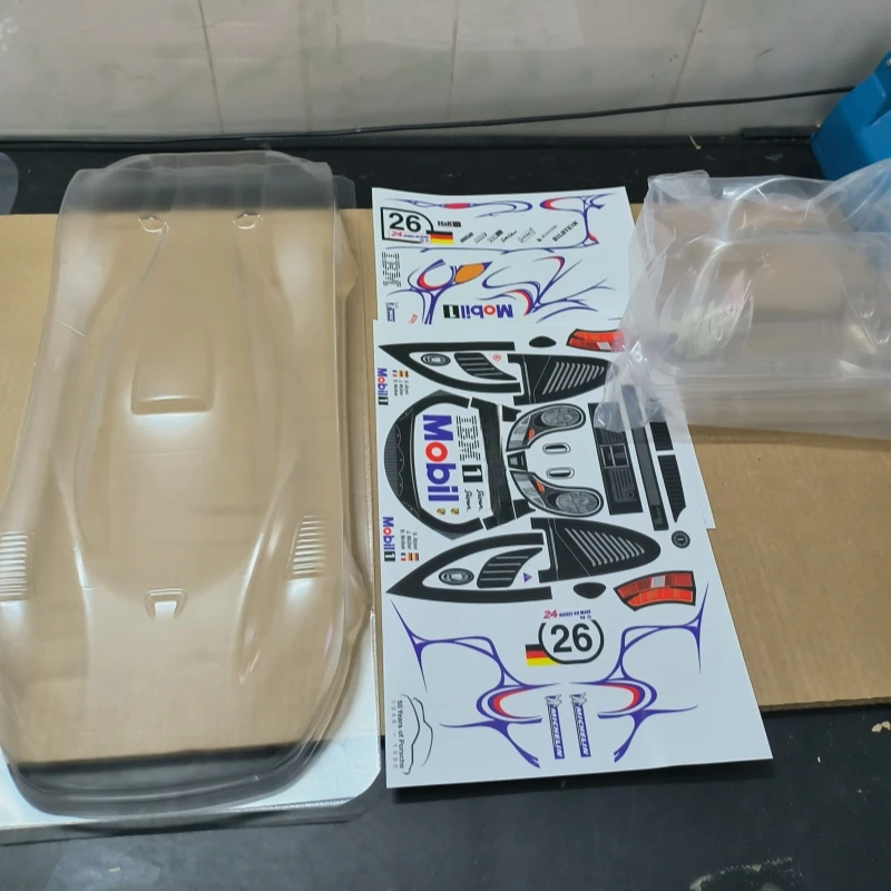 TC211 1/10 Porssche 911 GT1 LM Прозрачный лехаский корпус с задним крылом и мобильным наклейкой для дорожного автомобиля Tamiya tt02 Kyosho
TC211 1/10 Porssche 911 GT1 LM Прозрачный лехаский корпус с задним крылом и мобильным наклейкой для дорожного автомобиля Tamiya tt02 Kyosho