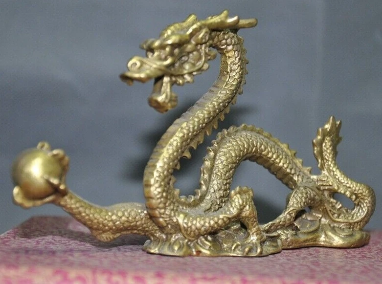 old Chinese brass bronze lucky Zodiac feng shui animal Dragon play dragon statue
old Chinese brass bronze lucky Zodiac feng shui animal Dragon play dragon statue