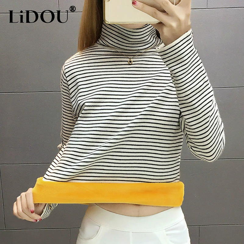 2023 Autumn Winter Striped Fashion Turtleneck Long Sleeve T-Shirts Women Casual Loose Contrast Color Plus Velvet Warm Pullovers
2023 Autumn Winter Striped Fashion Turtleneck Long Sleeve T-Shirts Women Casual Loose Contrast Color Plus Velvet Warm Pullovers