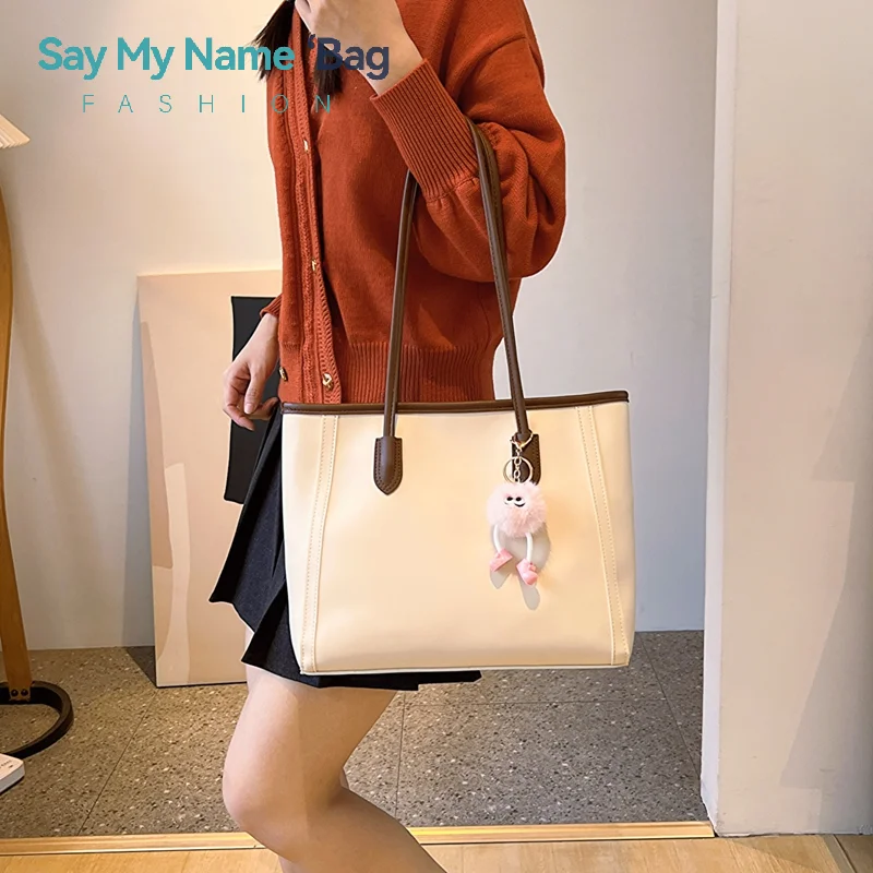 Корейская модная женская сумка для пригородных поездок, новинка 2025 года, модная универсальная сумка через плечо, высококачественная мягкая сумка-тоут из искусственной кожи
Корейская модная женская сумка для пригородных поездок, новинка 2025 года, модная универсальная сумка через плечо, высококачественная мягкая сумка-тоут из искусственной кожи
