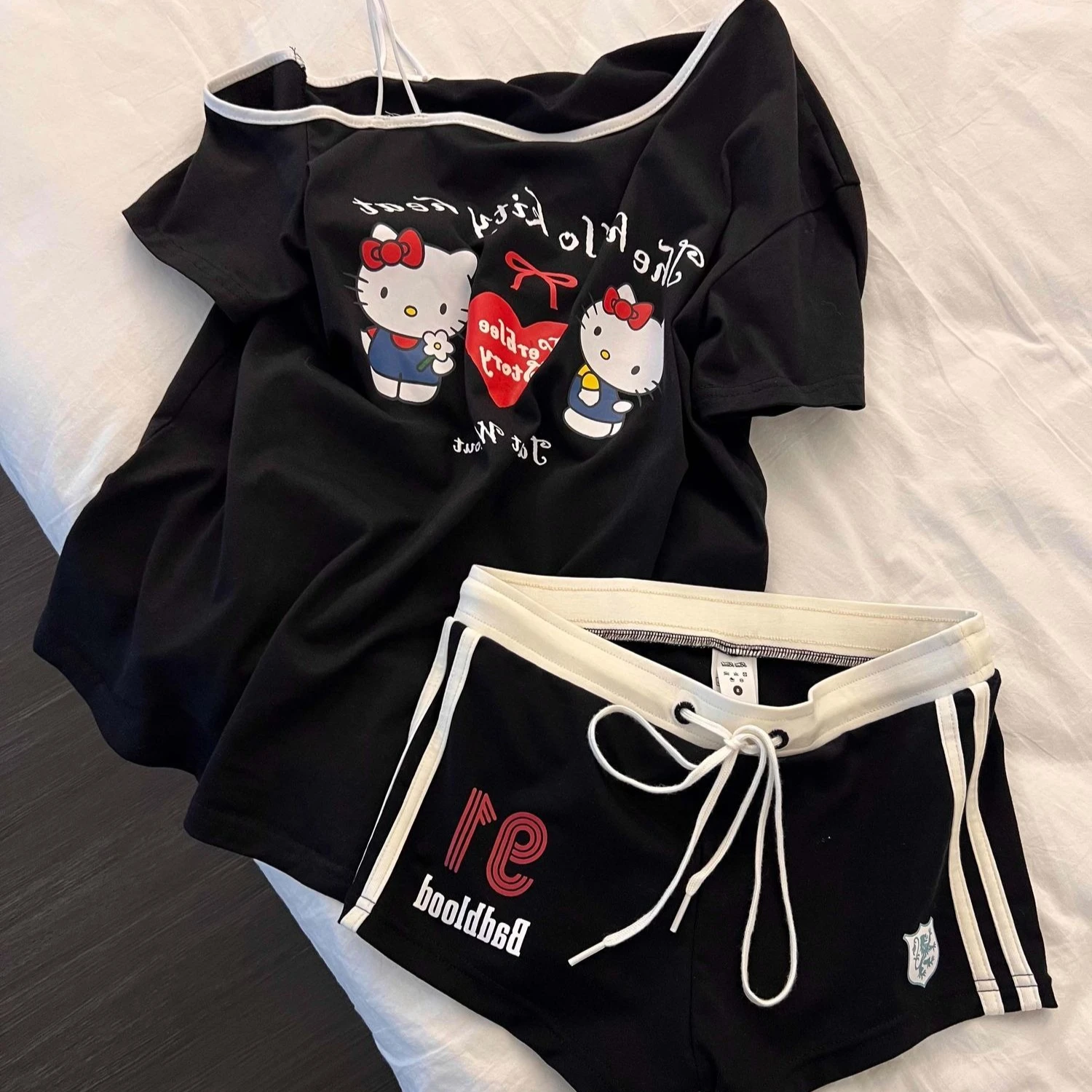 Sanrio Hello Kitty 2 Piece Outfit , Cute Short Sleeve Top & Drawstring Shorts, Tracksuit, Slim Fit Loungewear for Daily Wear
Sanrio Hello Kitty 2 Piece Outfit , Cute Short Sleeve Top & Drawstring Shorts, Tracksuit, Slim Fit Loungewear for Daily Wear