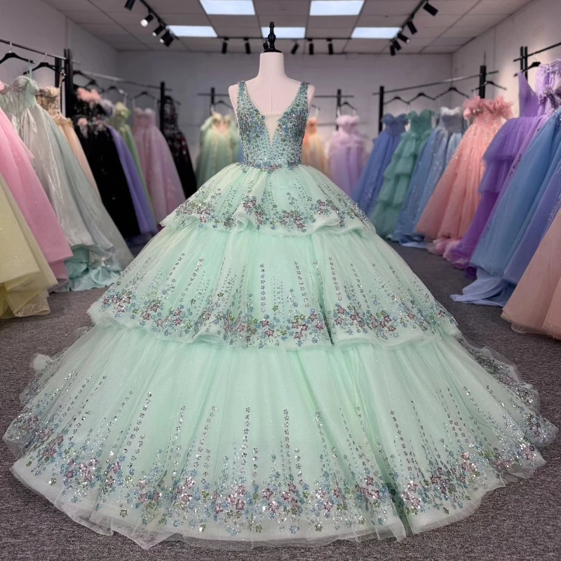Sparkly Mint Green Princess Quinceanera Dresses Ball Gown Sequin Appliques Lace Crystals Beads Tull Tiered Sweet 16 Dress vestid
Sparkly Mint Green Princess Quinceanera Dresses Ball Gown Sequin Appliques Lace Crystals Beads Tull Tiered Sweet 16 Dress vestid