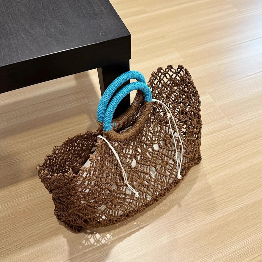 New Niche Original Versatile Straw Woven Bag Hollow Ins Woven Summer Handbag Beach Texture Unique Fashion Simple Dark Brown
New Niche Original Versatile Straw Woven Bag Hollow Ins Woven Summer Handbag Beach Texture Unique Fashion Simple Dark Brown