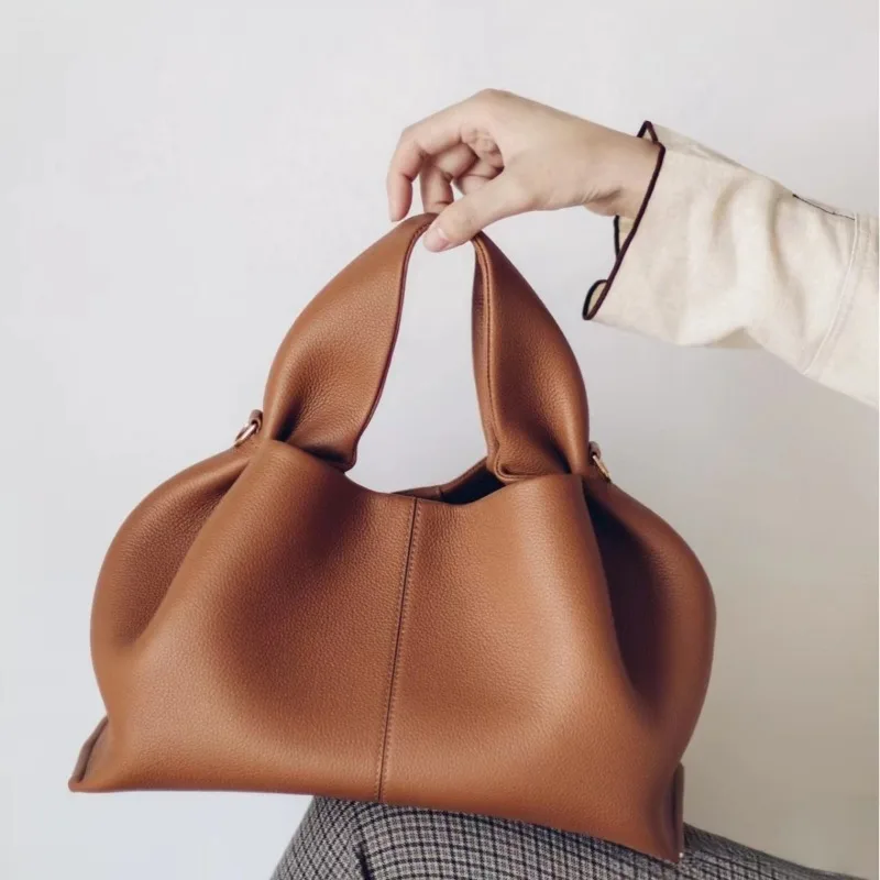 1pcs Genuine Leather Cloud Crossbody Bag Versatile Dumpling Handbag Shoulder Bag Versatile Solid Color Commuter Bag
1pcs Genuine Leather Cloud Crossbody Bag Versatile Dumpling Handbag Shoulder Bag Versatile Solid Color Commuter Bag