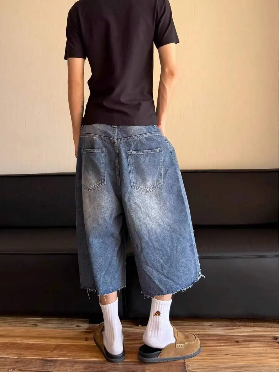 Distressed Wide-Leg Cropped Denim Pants With Pearl Accents, Loose Fit Casual Shorts For Unisex Wear
Distressed Wide-Leg Cropped Denim Pants With Pearl Accents, Loose Fit Casual Shorts For Unisex Wear