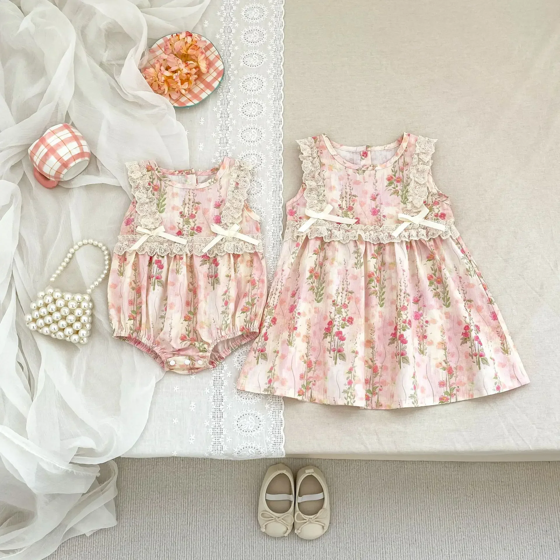 Baby Girls' Summer Korean Pure Cotton Lining Sleeveless Princess Dress & Romper Set - All - Over Floral Print Lace and Bows
Baby Girls' Summer Korean Pure Cotton Lining Sleeveless Princess Dress & Romper Set - All - Over Floral Print Lace and Bows