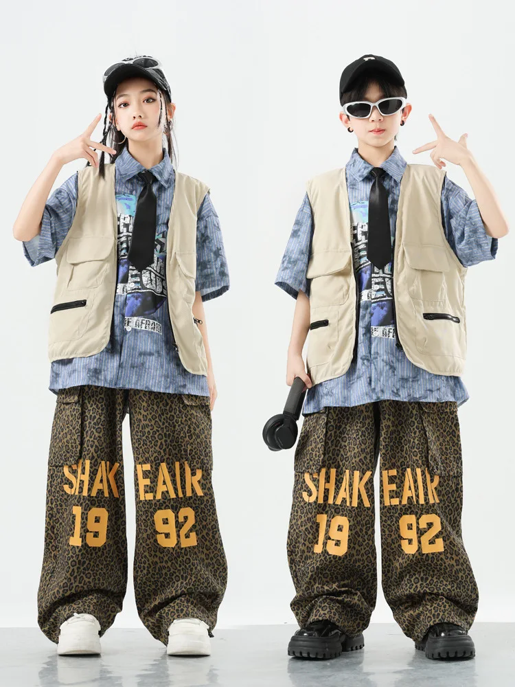 Kid Kpop Hip Hop Clothing Beige Vest Blue Striped Shirt Top Leopard Print Casual Letters Cargo Pants for Girl Boy Dance Costumes
Kid Kpop Hip Hop Clothing Beige Vest Blue Striped Shirt Top Leopard Print Casual Letters Cargo Pants for Girl Boy Dance Costumes