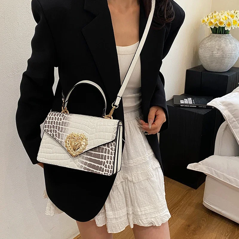 Designer Crossbody Diaper Bag: Elegant Women's Handbag With Minimalist Vintage Look And Large Capacity For Shopping Tote
Designer Crossbody Diaper Bag: Elegant Women's Handbag With Minimalist Vintage Look And Large Capacity For Shopping Tote