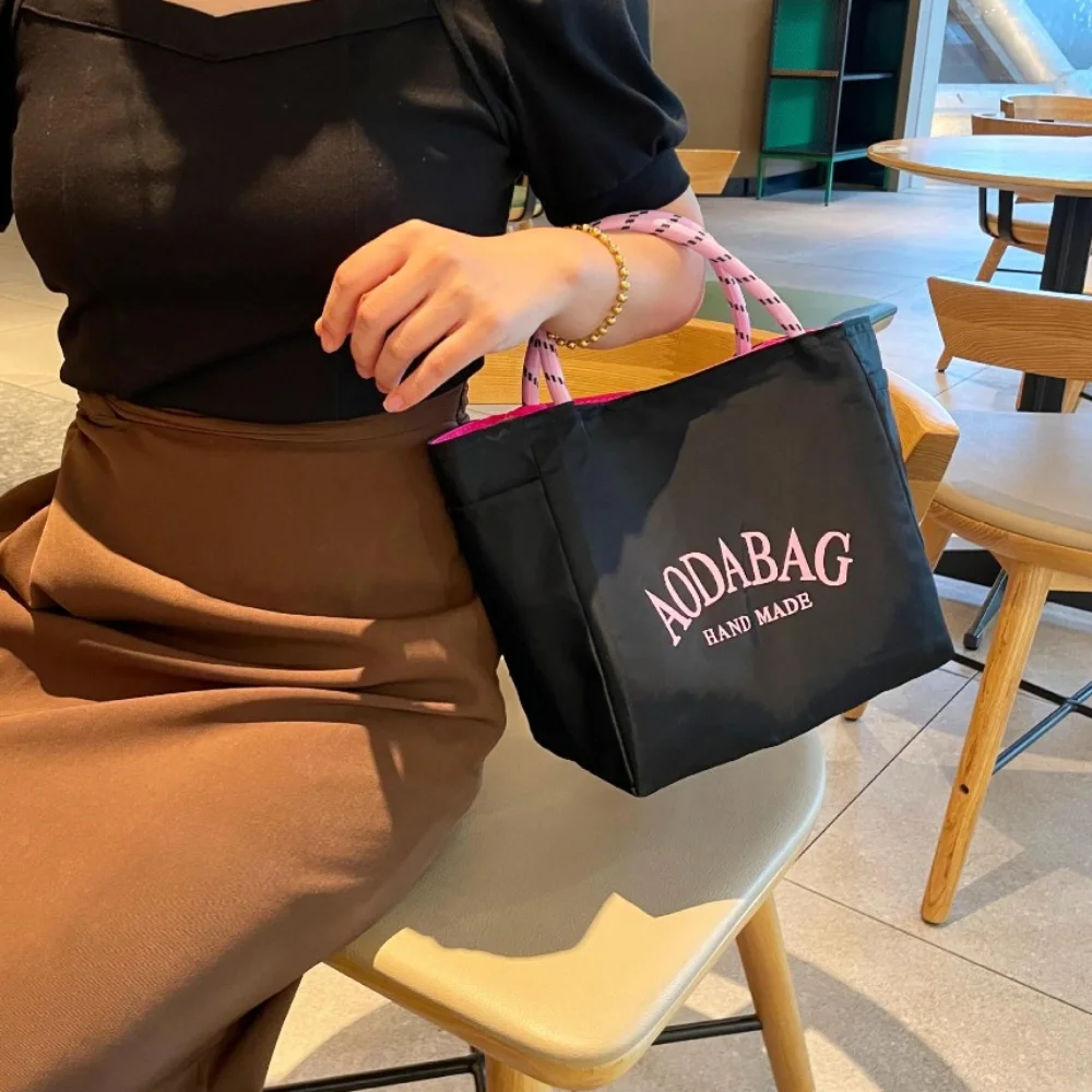Storage Multifunctional Letter Handbag Umbrella Fabric Waterproof Mommy Bag Contrast Color Large Capacity Lunch Bag Mother
Storage Multifunctional Letter Handbag Umbrella Fabric Waterproof Mommy Bag Contrast Color Large Capacity Lunch Bag Mother