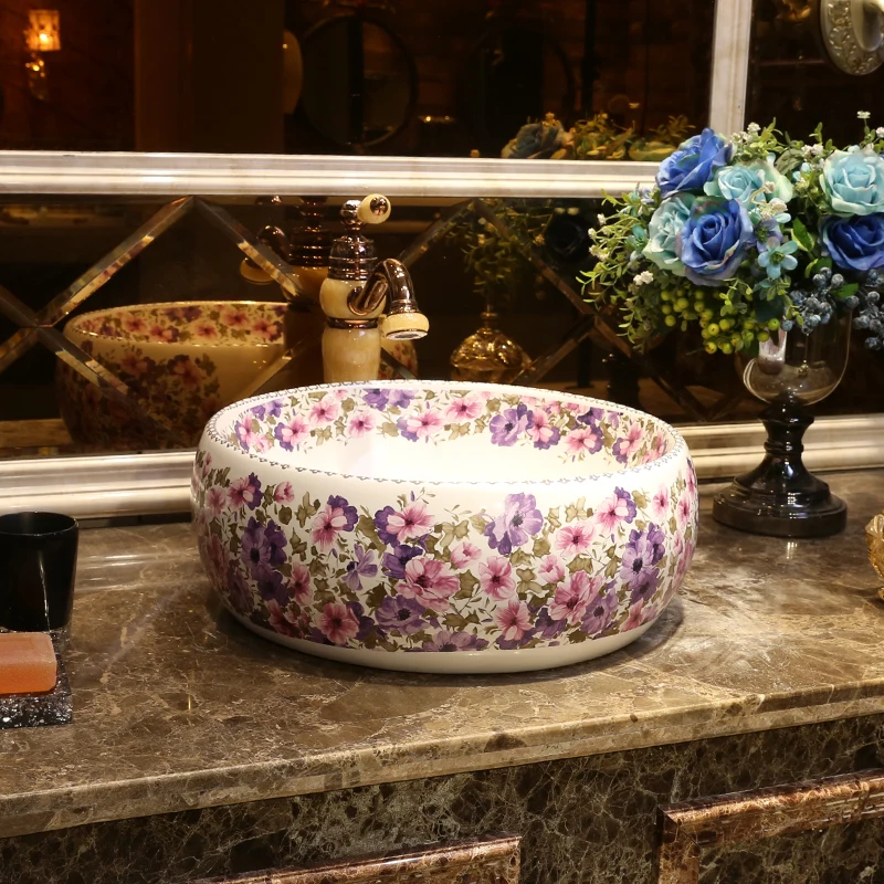 Colorful Artistic wash Basin European Style Ceramic Washbasin round Basin Home ceramic Wash Basin bathroom sink
Colorful Artistic wash Basin European Style Ceramic Washbasin round Basin Home ceramic Wash Basin bathroom sink