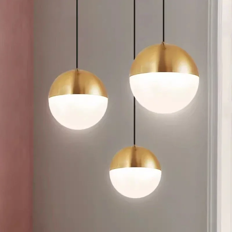 Nordic modern simple golden ball chandelier designer light luxury restaurant bar bedside window single
Nordic modern simple golden ball chandelier designer light luxury restaurant bar bedside window single