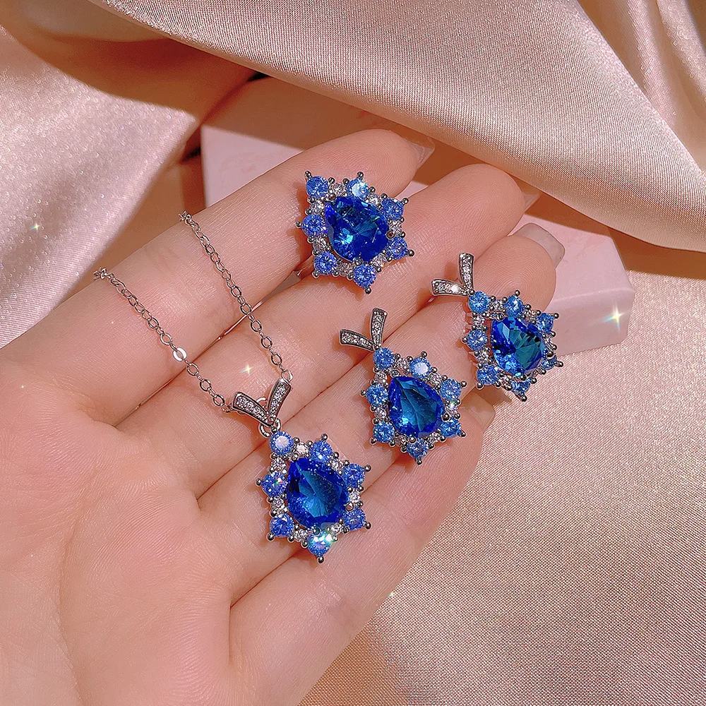 Creative Sapphire Water Drop Pear V Shape Three-Piece Ring Pendant Necklace Stud Earring For Women Blue Wedding Gift Jewelry
Creative Sapphire Water Drop Pear V Shape Three-Piece Ring Pendant Necklace Stud Earring For Women Blue Wedding Gift Jewelry