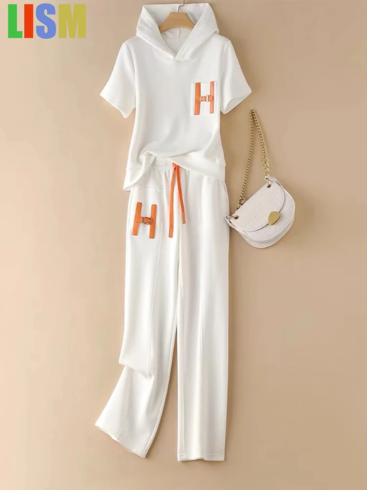 LISM tracksuit Summer 2 pieces set for woman pant suits women's slimming short sleeved sports top wide leg pants two-piece set 
LISM tracksuit Summer 2 pieces set for woman pant suits women's slimming short sleeved sports top wide leg pants two-piece set