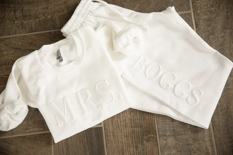 Personalized Embossed Bridal Gift Set Honeymoon Outfit New Mrs. Joggers Bride Sweatpants Wedding Day Custom Name Couple Sweater
Personalized Embossed Bridal Gift Set Honeymoon Outfit New Mrs. Joggers Bride Sweatpants Wedding Day Custom Name Couple Sweater