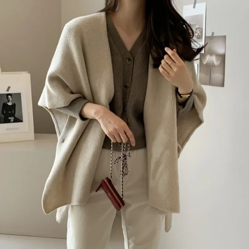 Korean Style Women's Knitted Shawl Jacket Casual Warm Knitted Cloak Elegant Solid Color Knitted Cardigan Sweater
Korean Style Women's Knitted Shawl Jacket Casual Warm Knitted Cloak Elegant Solid Color Knitted Cardigan Sweater