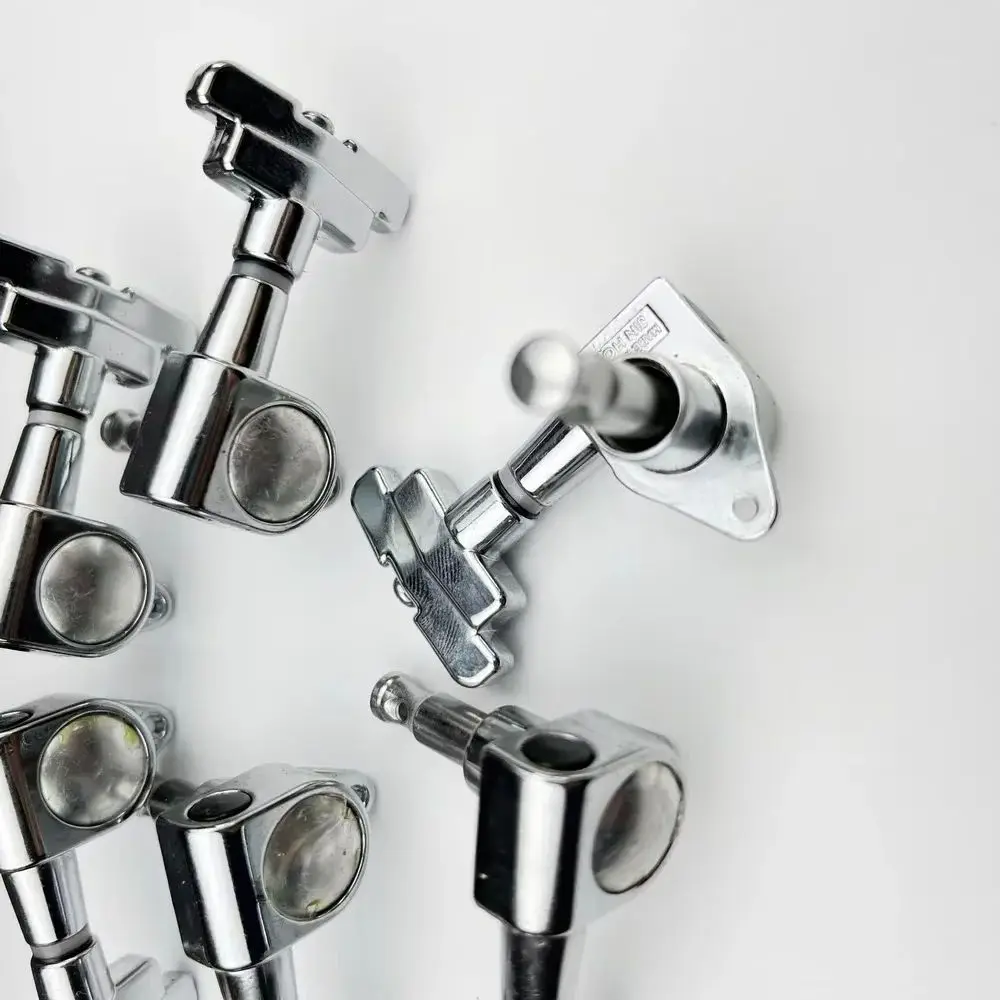 J-109 3R+3L Chrome Silver Electric Guitar Machine Heads Tuners Art Head Guitar Tuning Pegs
J-109 3R+3L Chrome Silver Electric Guitar Machine Heads Tuners Art Head Guitar Tuning Pegs