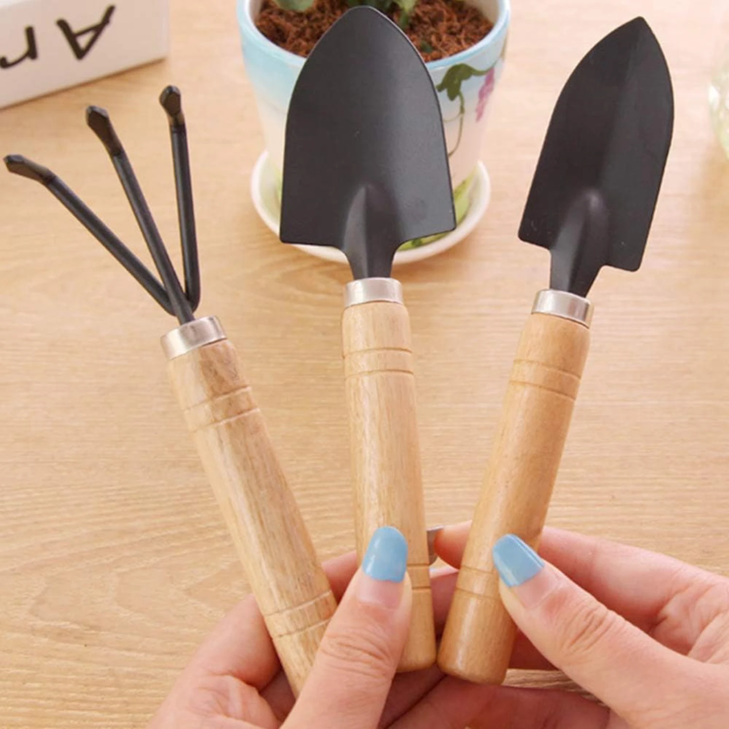 Efficient and Durable Black Metal Gardening Trowel - Set of 3 Mini Hand Planting Tools with Wood Handle including Small Shovel,
Efficient and Durable Black Metal Gardening Trowel - Set of 3 Mini Hand Planting Tools with Wood Handle including Small Shovel,