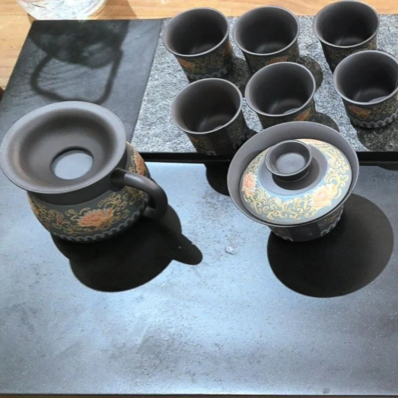 Such as porcelain moving purple sand kung fu tea set household teapot teacup high-end new high-end business souvenir
Such as porcelain moving purple sand kung fu tea set household teapot teacup high-end new high-end business souvenir