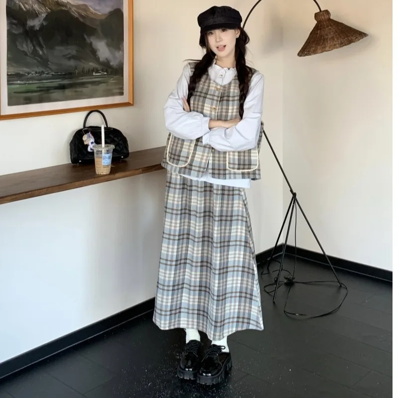 Шикарный синий клетчатый жилет, топ, юбка с высокой талией и воротник-стойка, комплект футболок для женщин, сладкий антивозрастной корейский сле
Шикарный синий клетчатый жилет, топ, юбка с высокой талией и воротник-стойка, комплект футболок для женщин, сладкий антивозрастной корейский сле