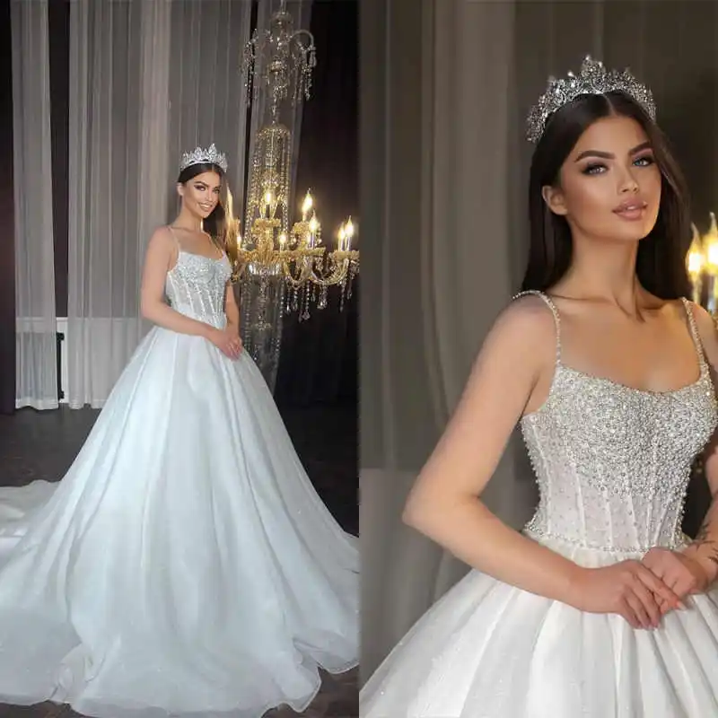 Elegant Beadeds Bridal Gowns Spaghetti Strap Sequins Ball Gown Wedding Dresses Customized Vestido De Novia
Elegant Beadeds Bridal Gowns Spaghetti Strap Sequins Ball Gown Wedding Dresses Customized Vestido De Novia