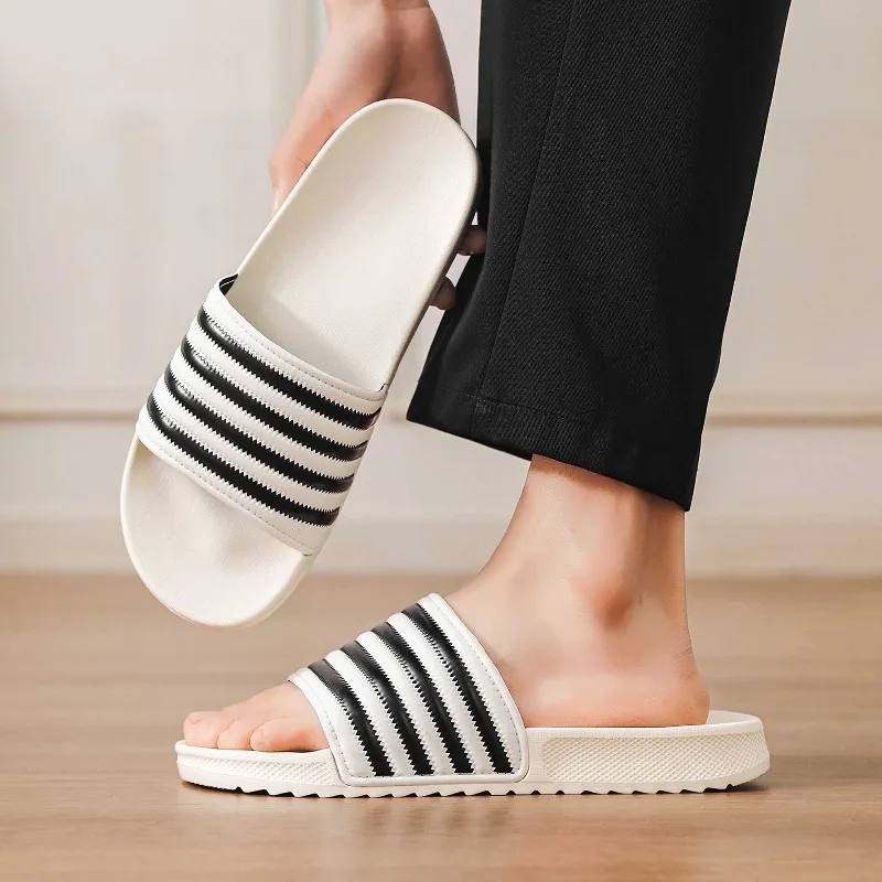Hot Selling Cold Bonded Four Stripe One Strap Slides Plus Size Non Slip Soft Sole Casual Outdoor Beach Slippers
Hot Selling Cold Bonded Four Stripe One Strap Slides Plus Size Non Slip Soft Sole Casual Outdoor Beach Slippers