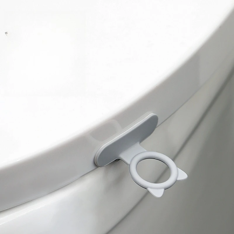 Силиконовая ручка сиденья для унитаза, клейкая защита от грязи, подъемник сиденья для унитаза
Силиконовая ручка сиденья для унитаза, клейкая защита от грязи, подъемник сиденья для унитаза